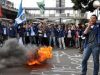 Polisi Bubarkan Paksa Unjuk Rasa Mahasiswa Makassar