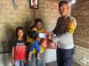 Peduli Stunting, Bhabinkamtibmas Kamatubun Berikan Bantuan Asupan Gizi