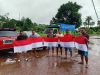 Gandeng Pemuda Almukmin, Ditintelkam Polda Maluku Bagi Bendera Merah Putih kepada Masyarakat